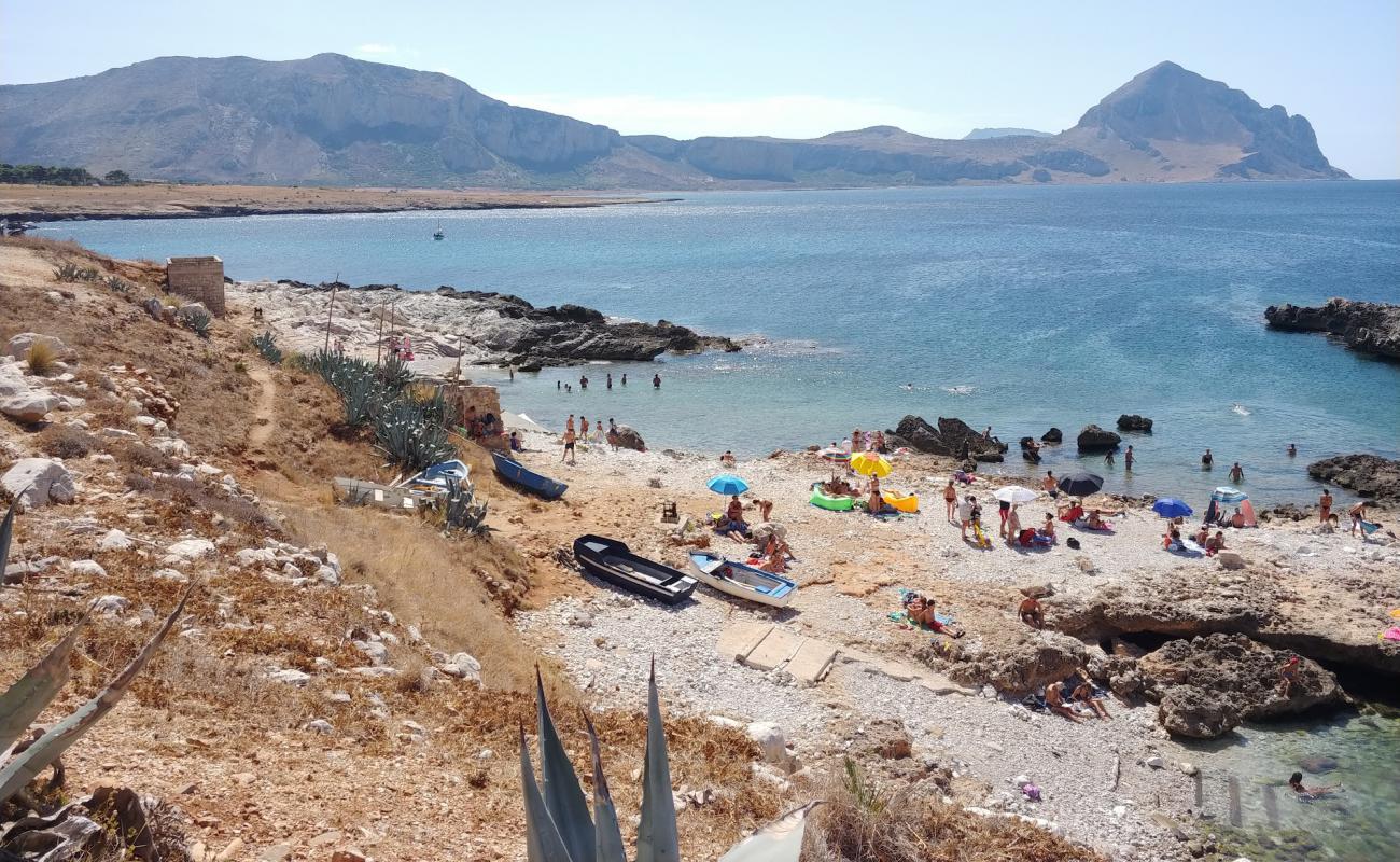 Photo of Isolidda beach with rocks cover surface