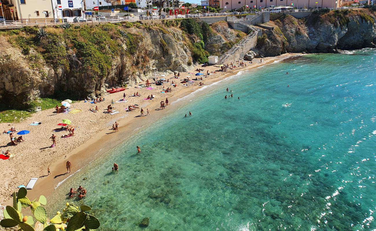 Photo of La Praiola beach with bright sand surface