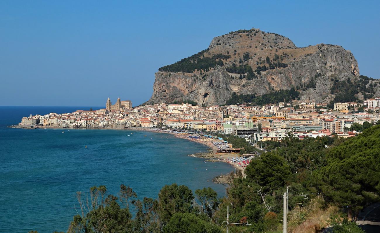 Photo of Cefalu beach with bright sand surface