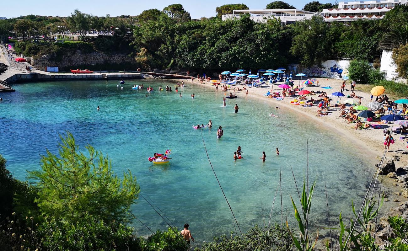 Photo of Spiaggia di Porto Cupo with brown sand surface