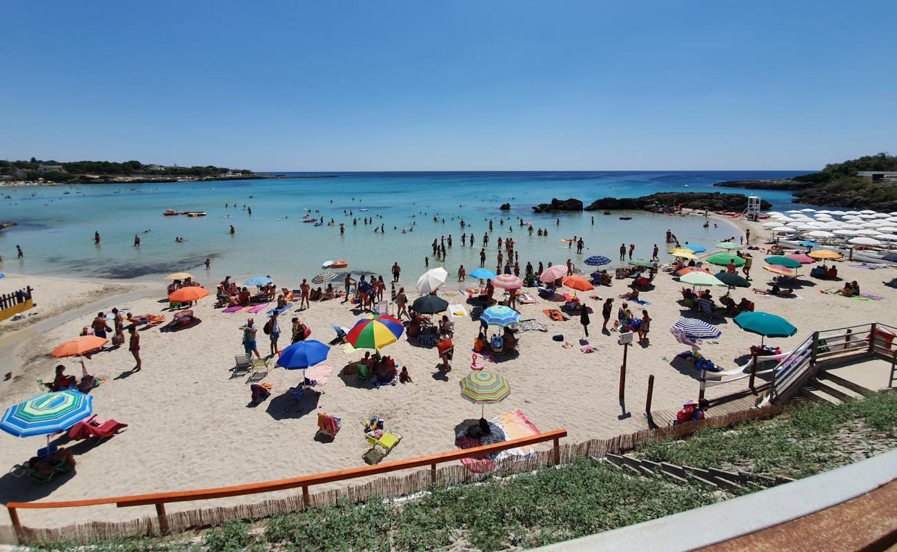 Photo of Baia delle Canne beach with brown sand surface