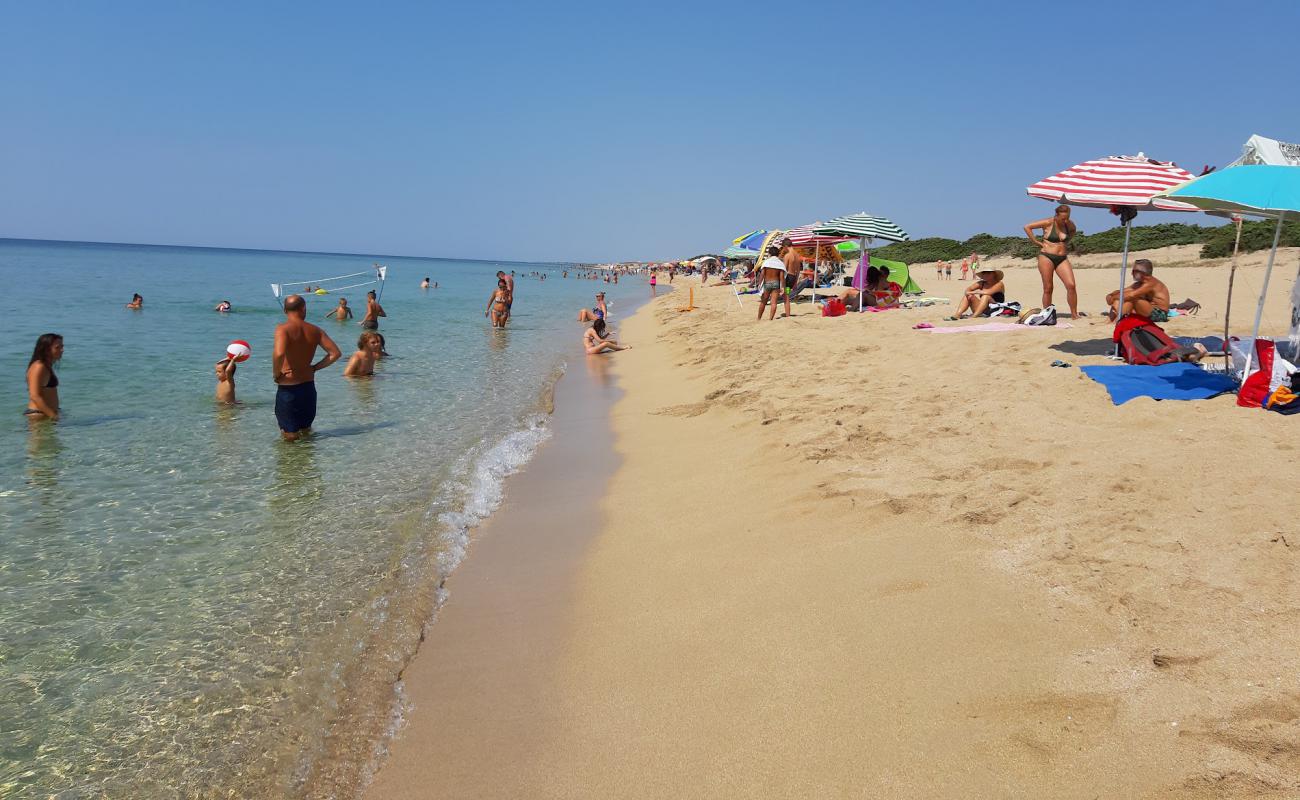 Photo of Torre Colimena beach with bright fine sand surface