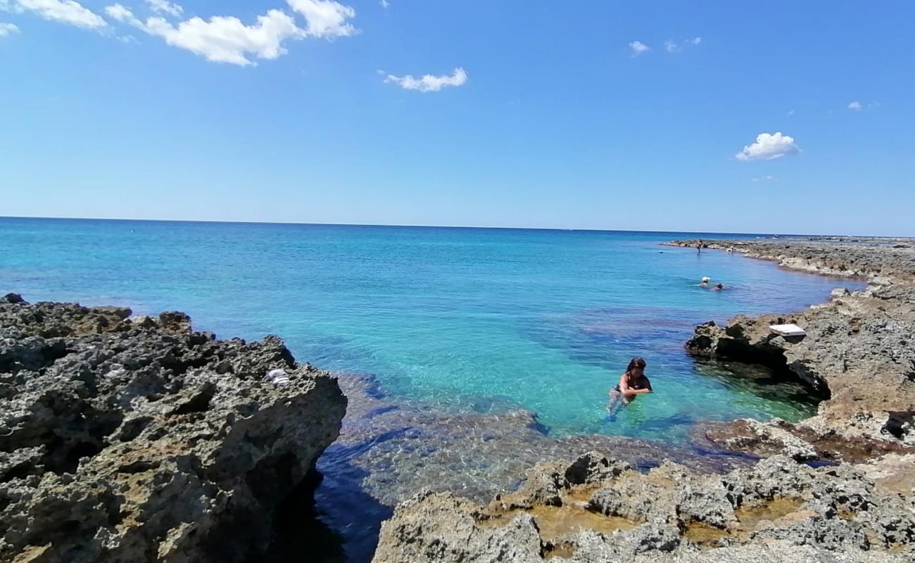 Photo of Spiaggia di Scianuli with rocks cover surface