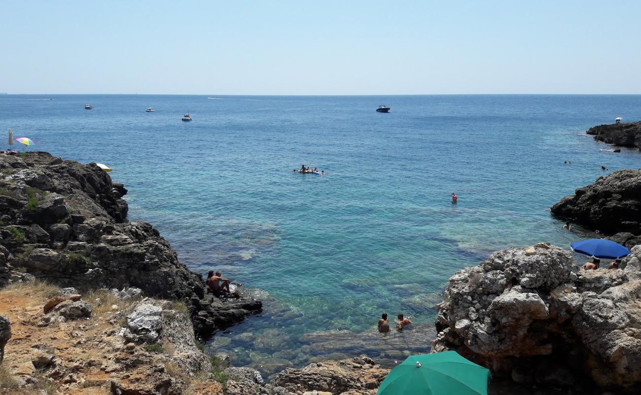 Photo of Baia di Torre Uluzzo with concrete cover surface