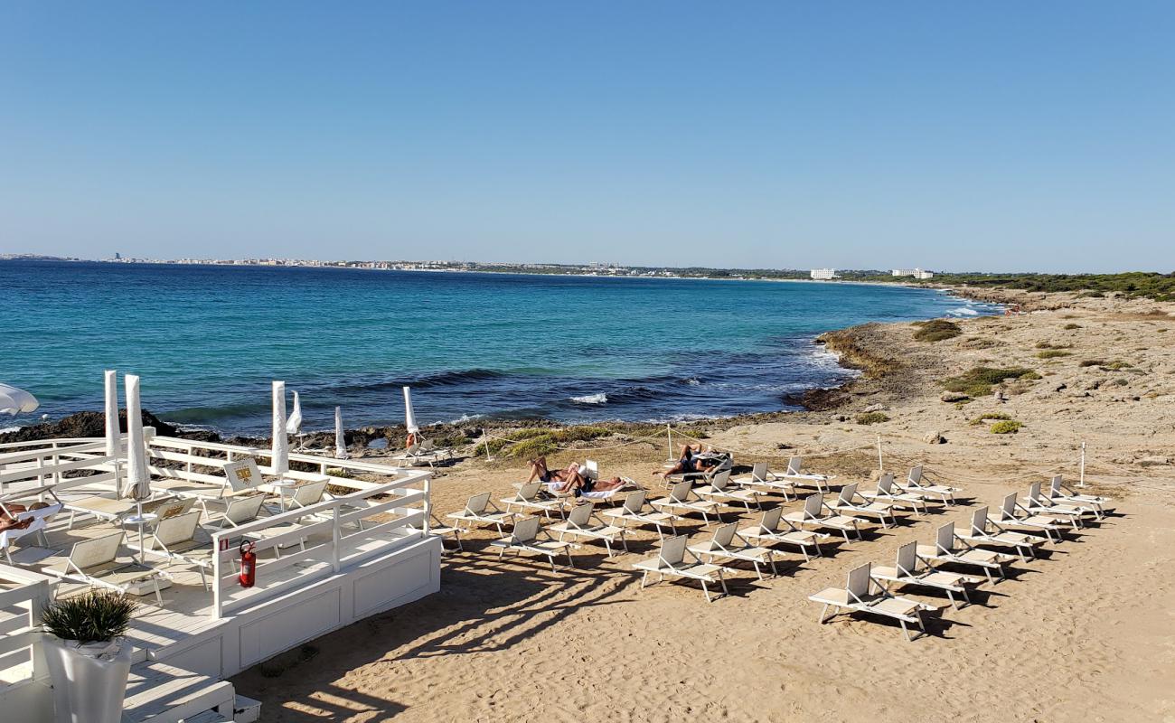 Photo of Spiaggia di Punta della Suina with concrete cover surface