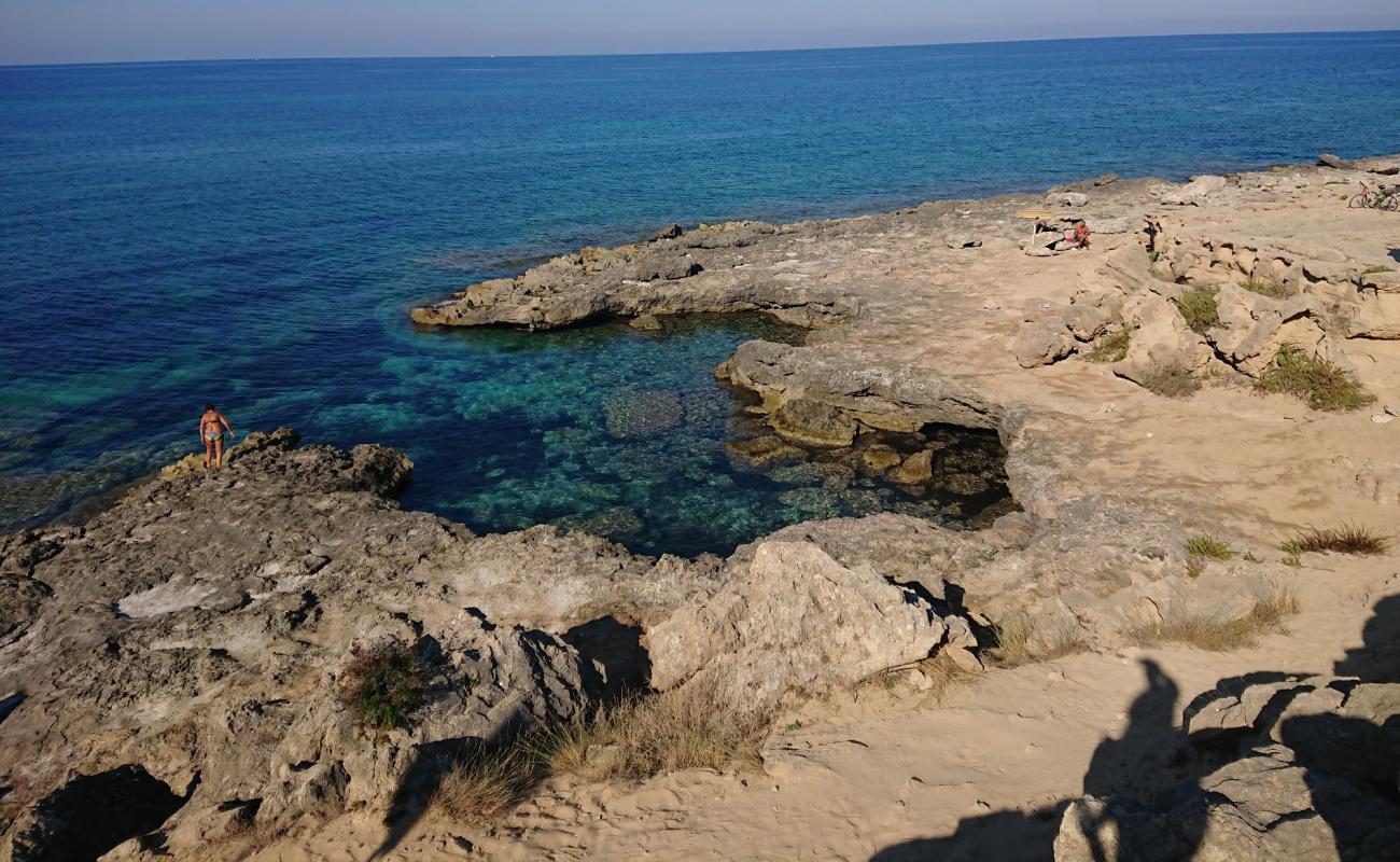 Photo of Spiaggia di Posto Li Sorci with rocks cover surface