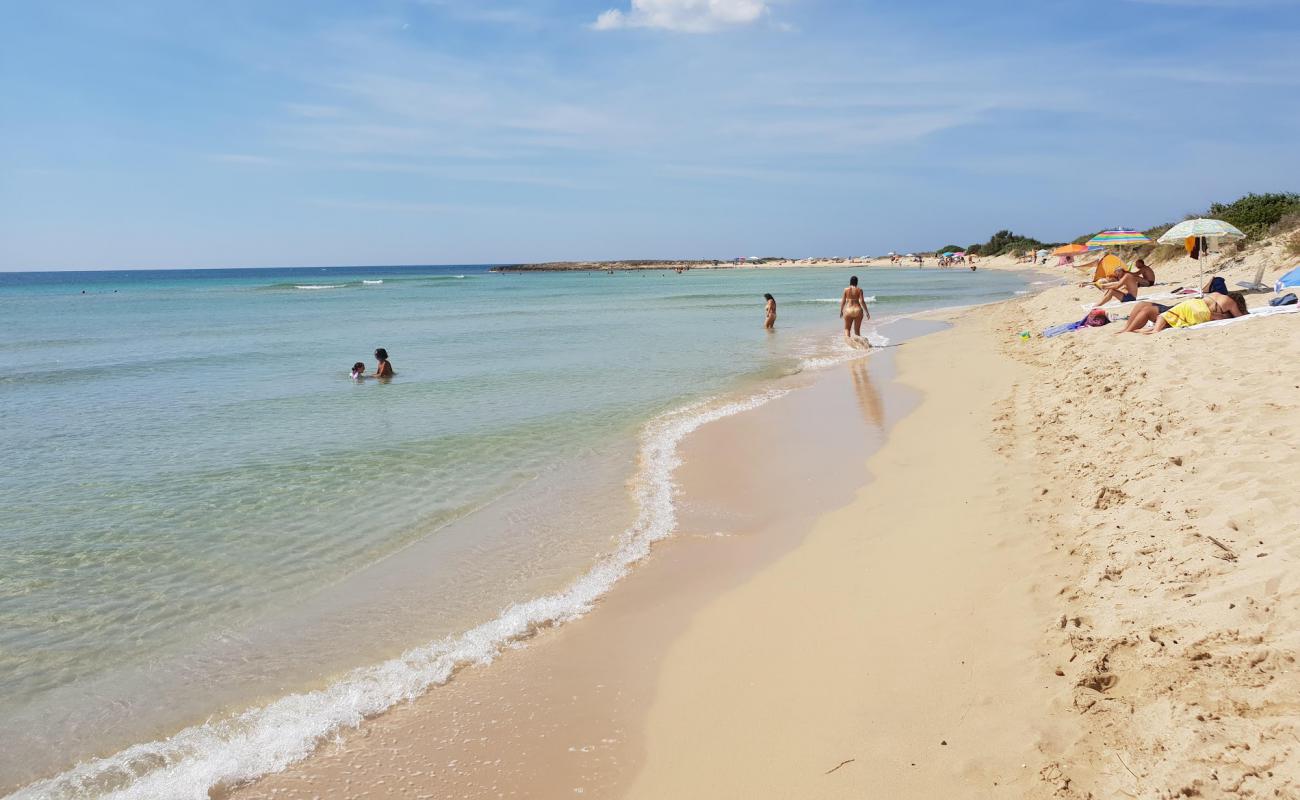 Photo of Punta Macolone beach with bright fine sand surface