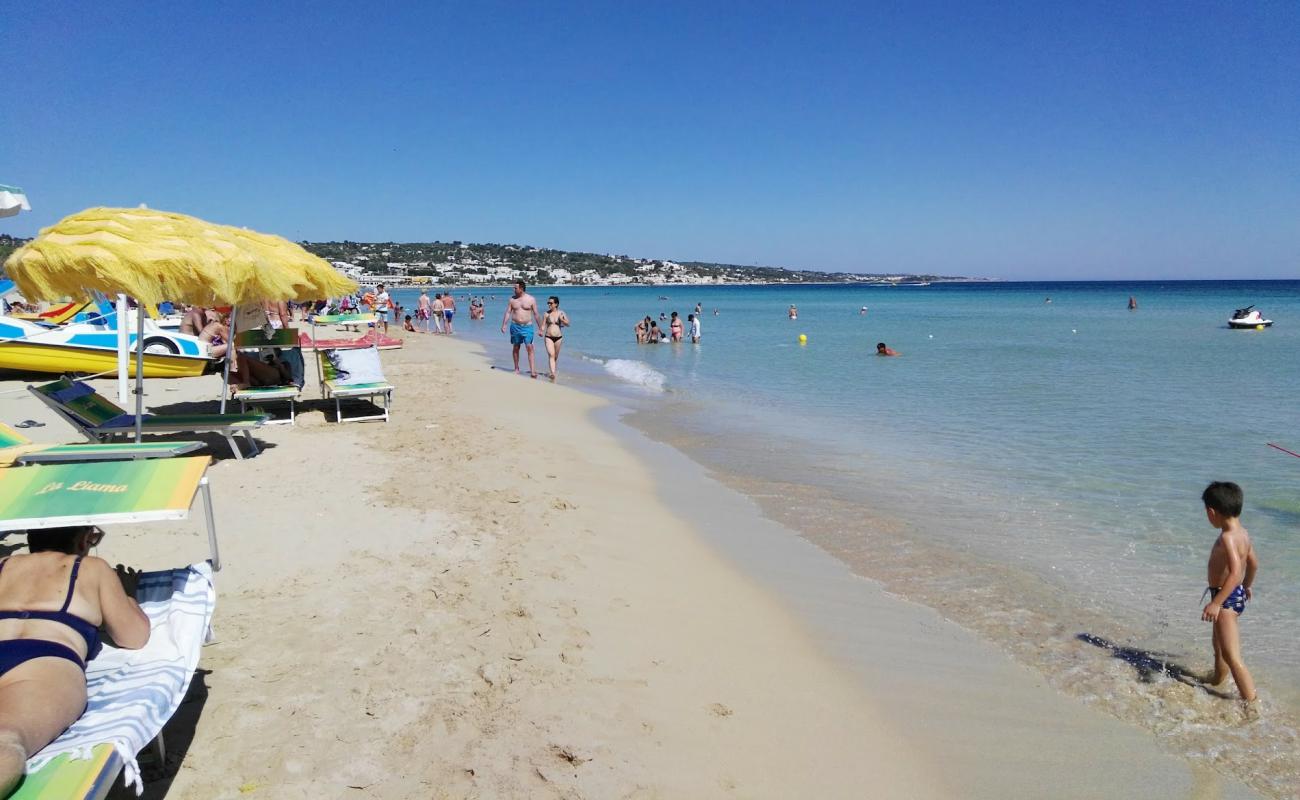 Photo of Pescoluse Beach with bright fine sand surface