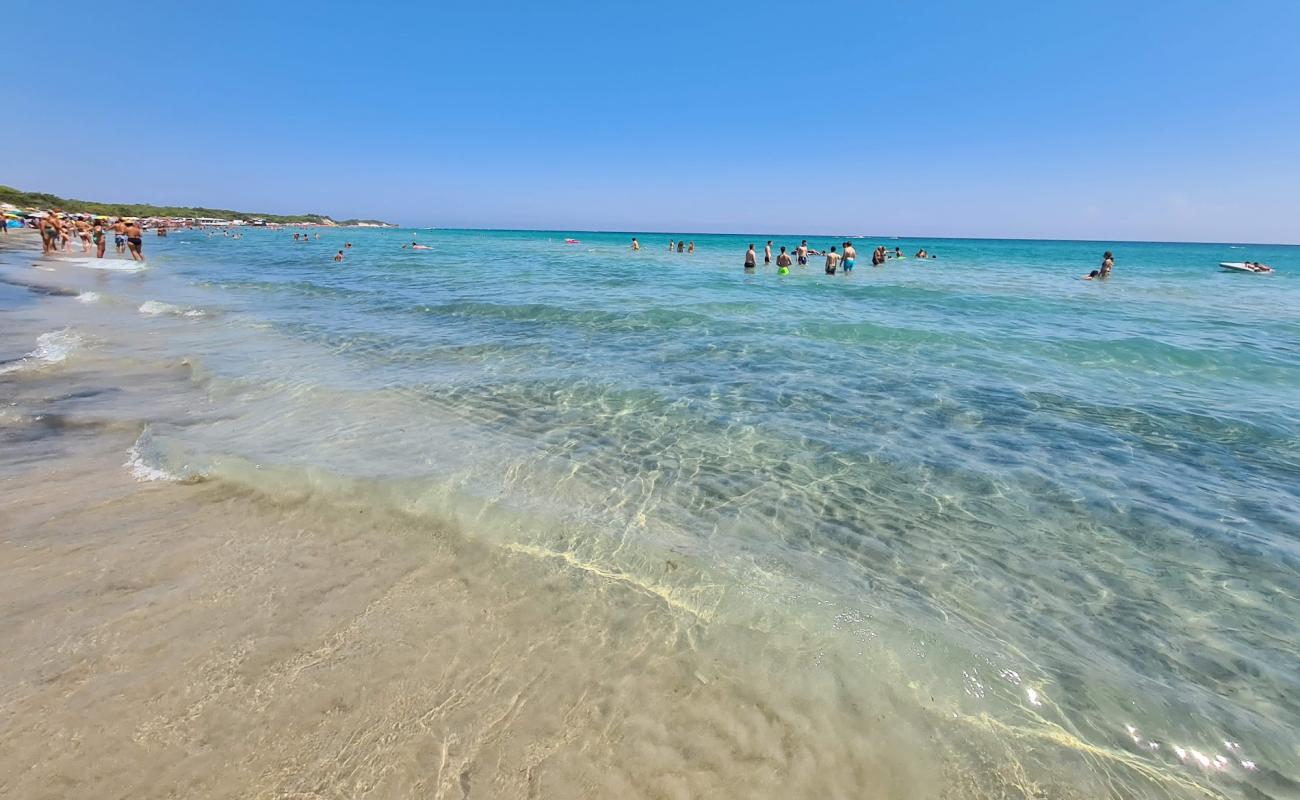 Photo of Alimini beach with bright fine sand surface