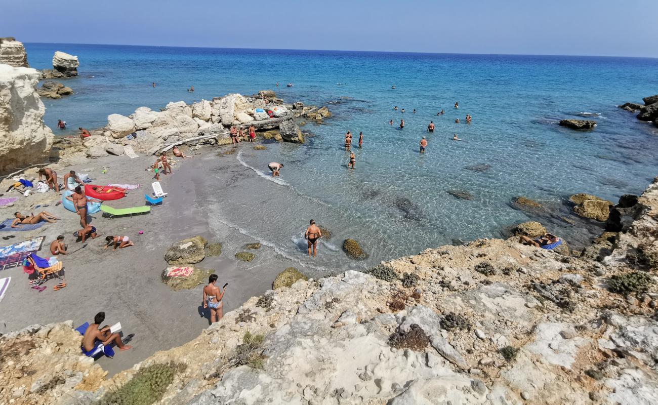 Photo of Conca Specchiulla beach with bright sand surface