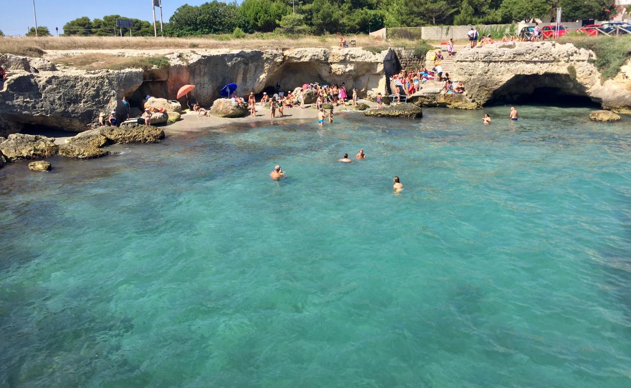 Photo of Nfucaciucci beach with rocks cover surface