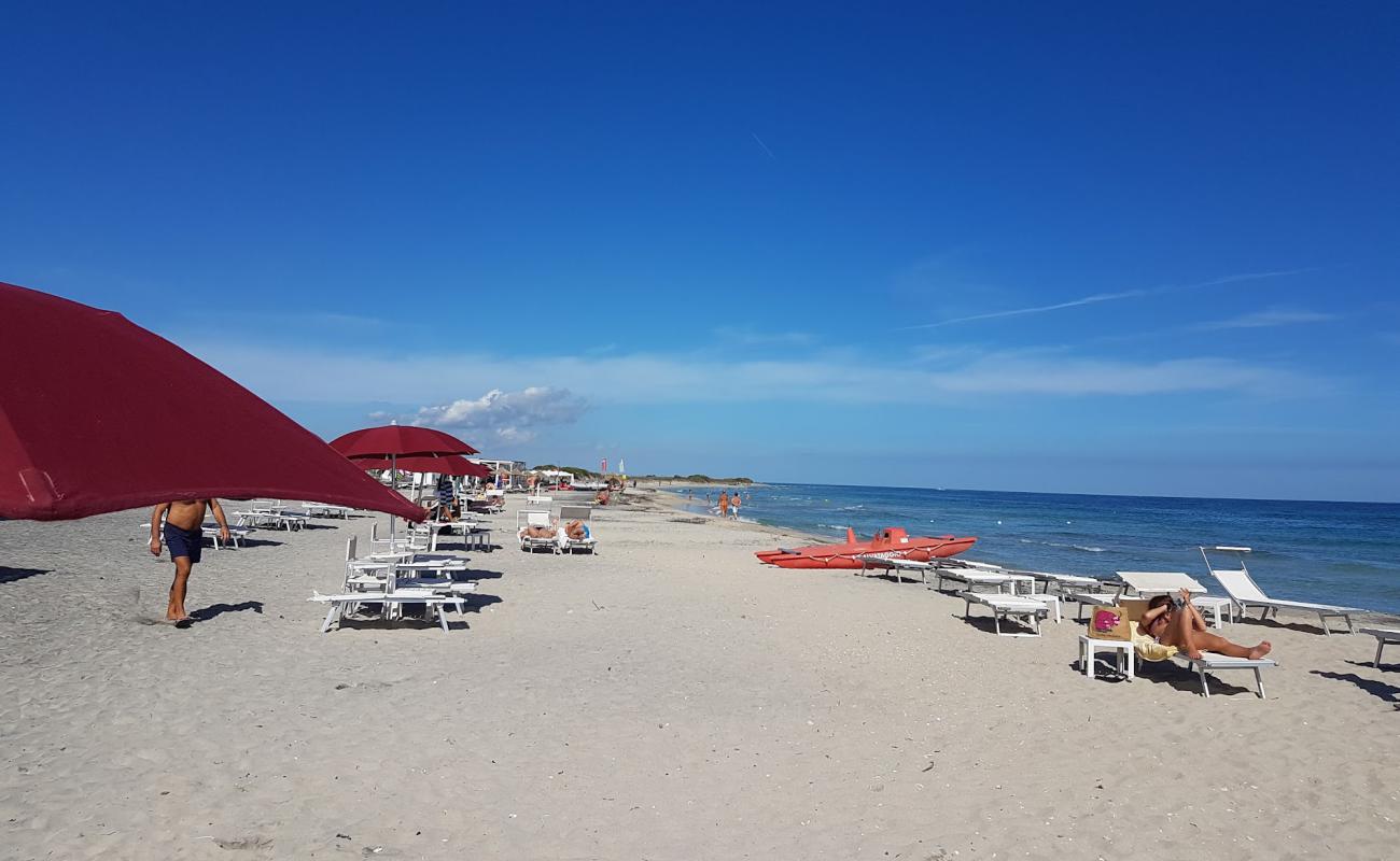 Photo of Ultima Spiaggia delle Cesine with bright sand surface