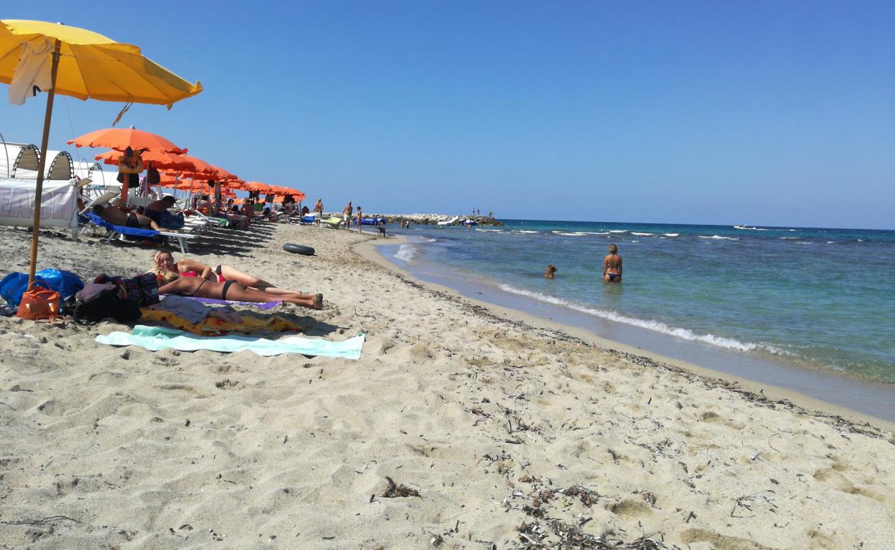 Photo of Spiaggia San Cataldo with bright sand surface