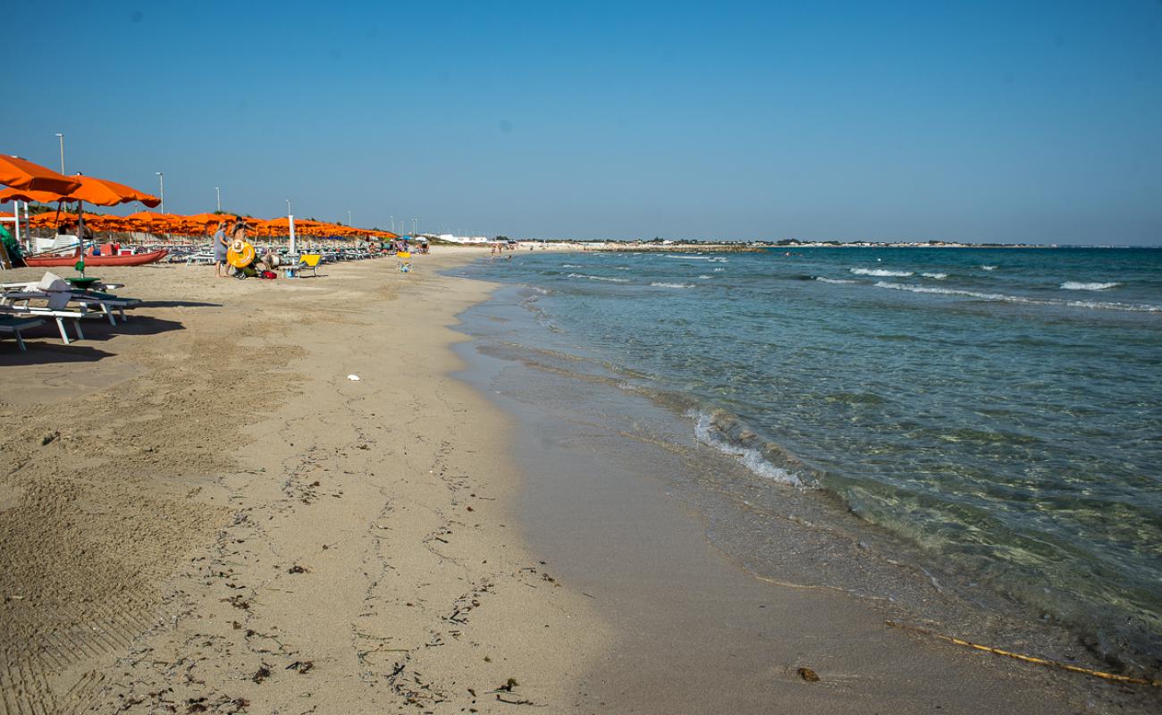 Photo of Maluha Bay with bright fine sand surface