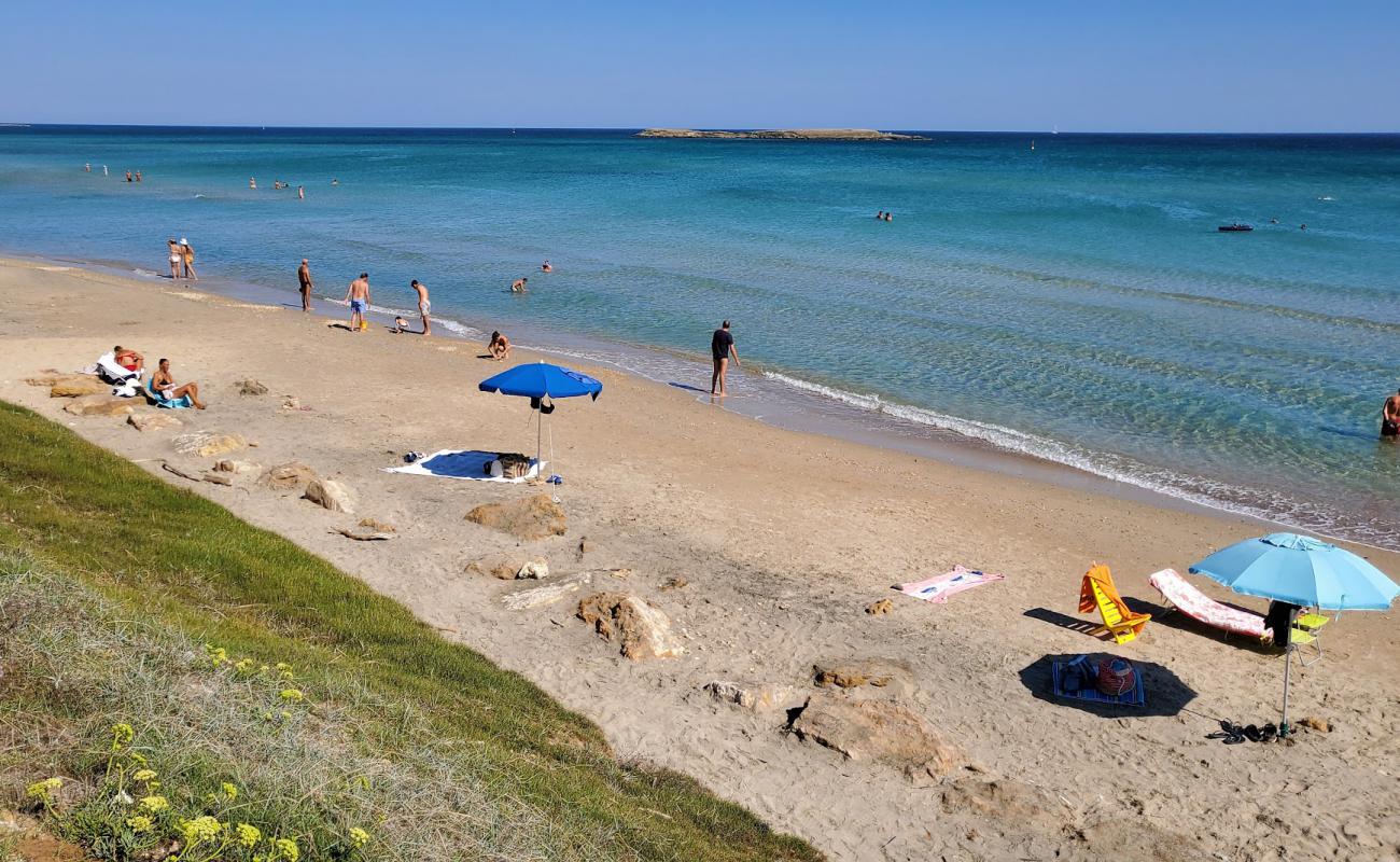 Photo of Posticeddu beach with bright fine sand surface