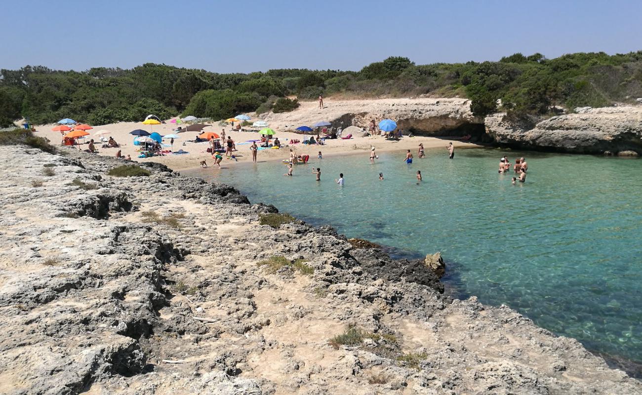 Photo of Spiaggia di Torre Pozzelle with bright sand surface