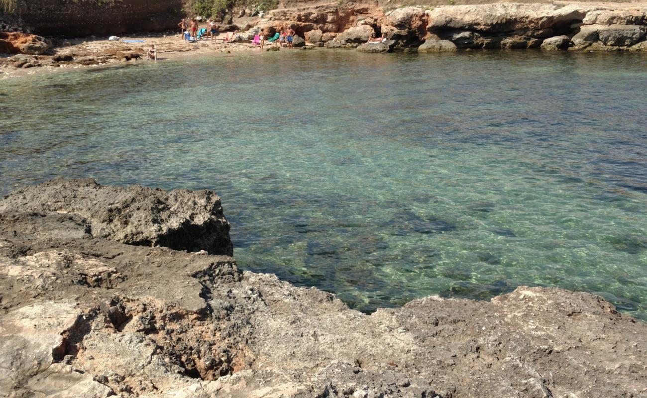 Photo of Cala Scizzo beach with gray sand &  rocks surface