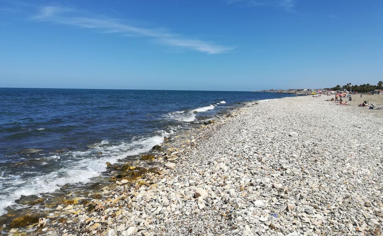 Photo of Torre Quetta beach with gray pebble surface