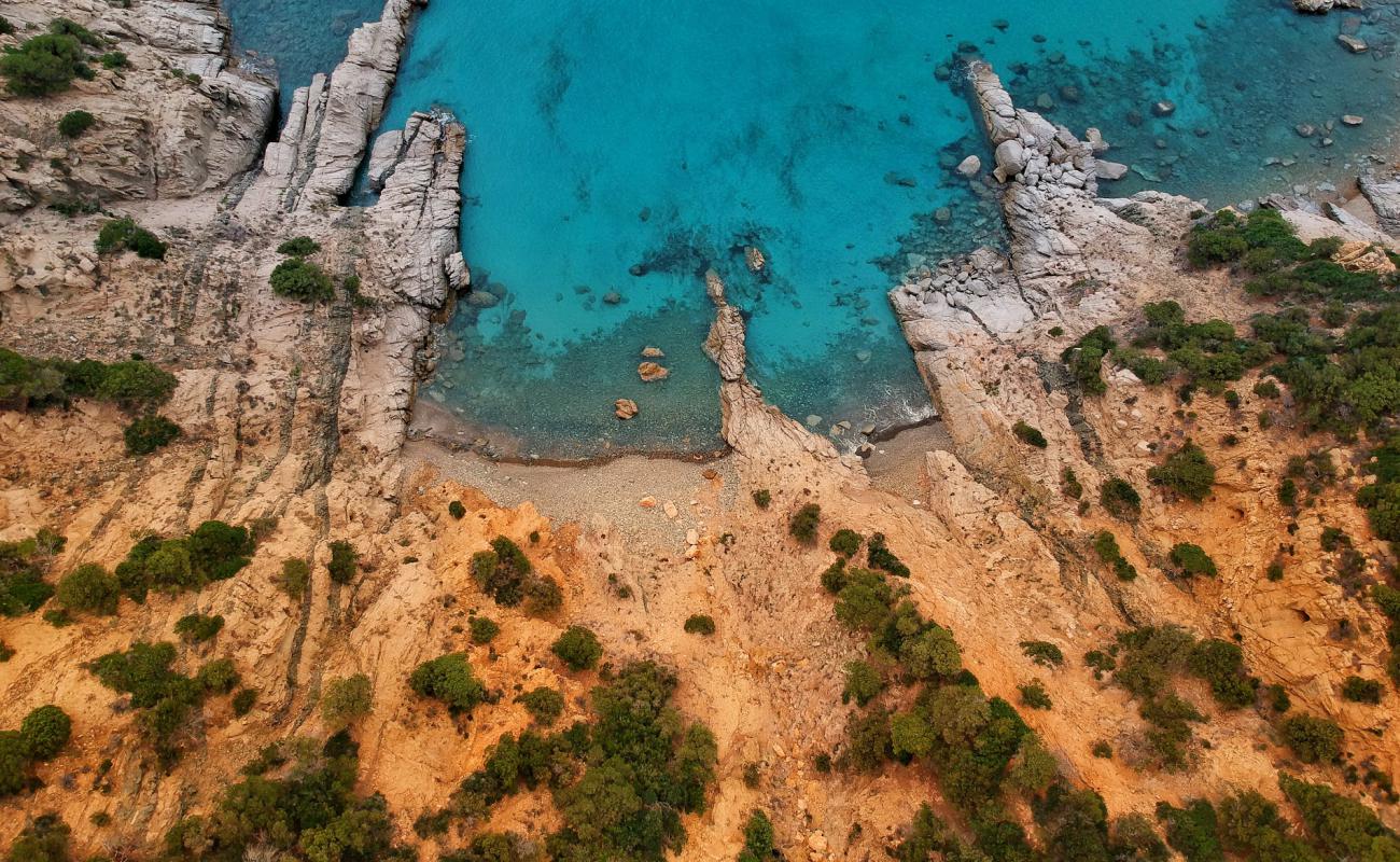 Photo of Cala Sirena with rocks cover surface