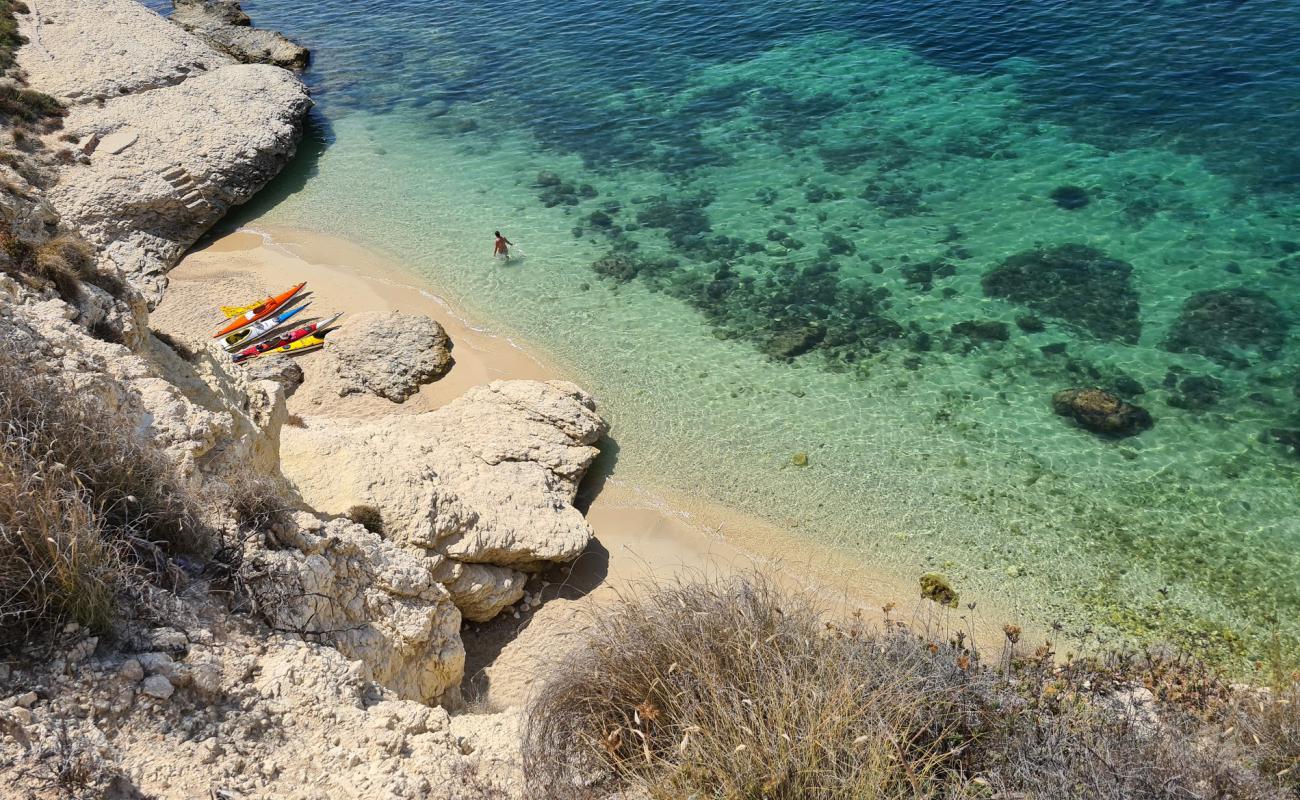 Photo of Cala Bernat with light sand &  pebble surface