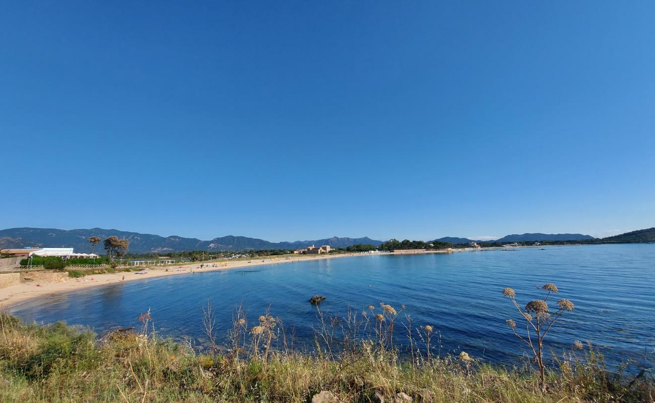 Photo of Spiaggia di Nora with bright fine sand surface