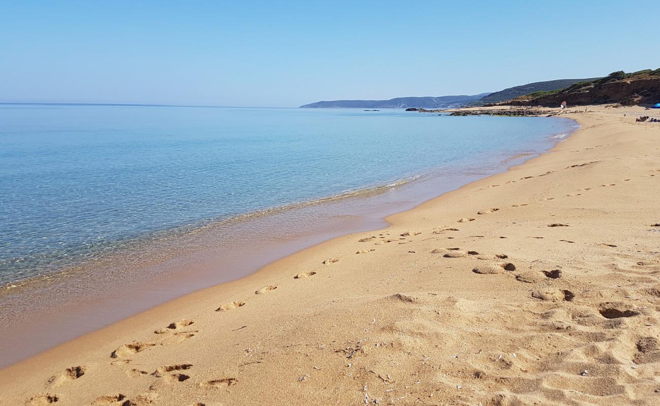 Photo of S'acquedda beach with bright sand surface