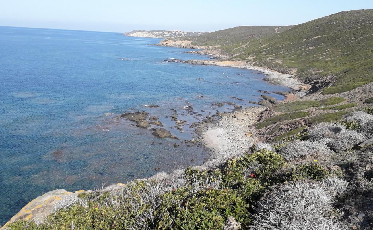 Photo of Caletta Babari with rocks cover surface