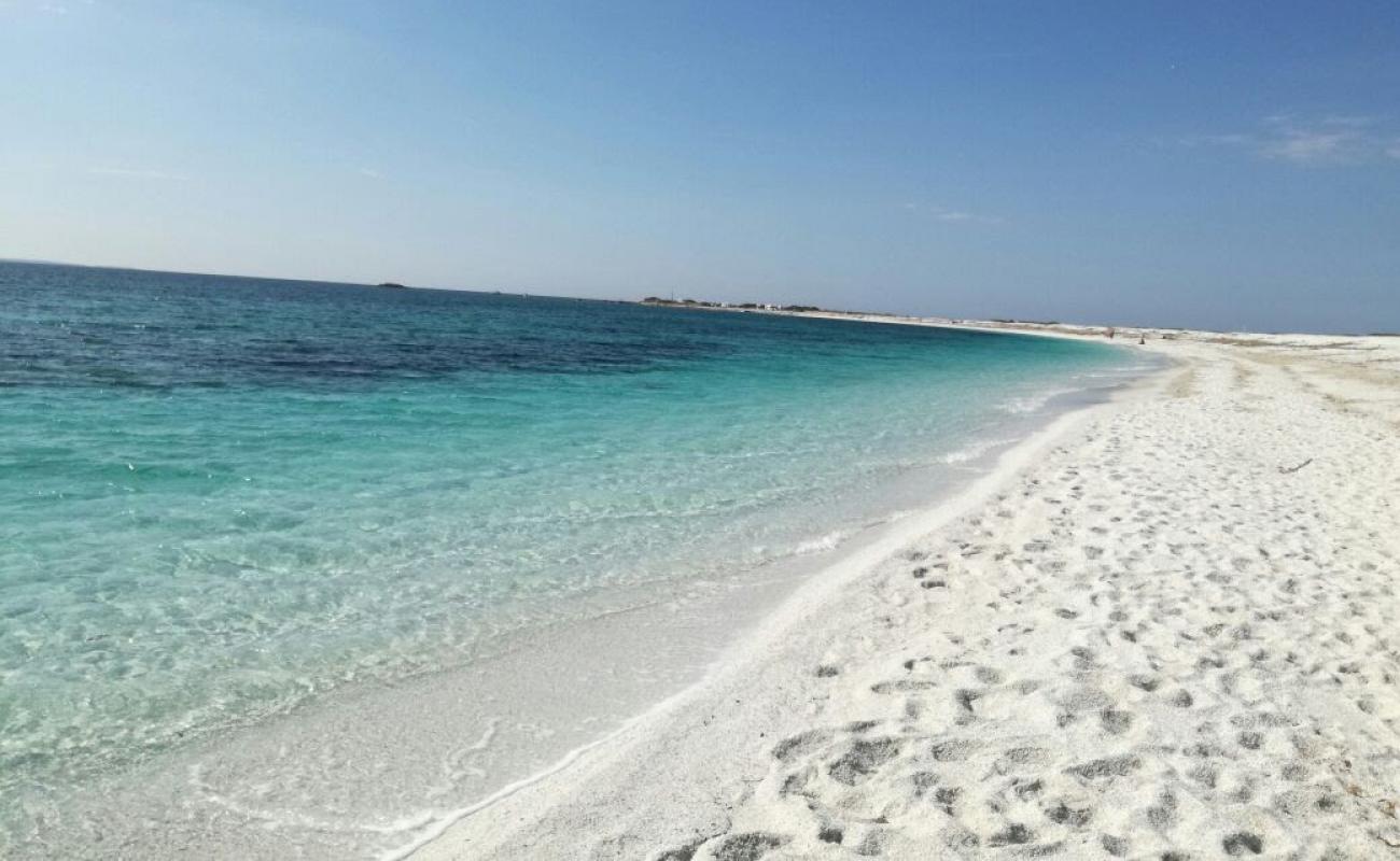 Photo of Spiaggia di Portu S'Uedda with bright sand surface