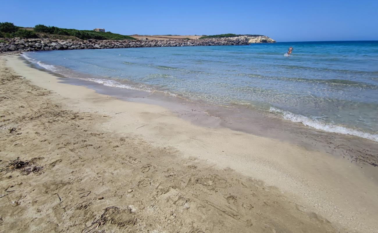 Photo of Spiaggia Di Is Benas with bright sand surface