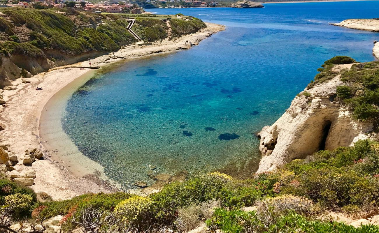 Photo of Arco beach with bright sand & rocks surface