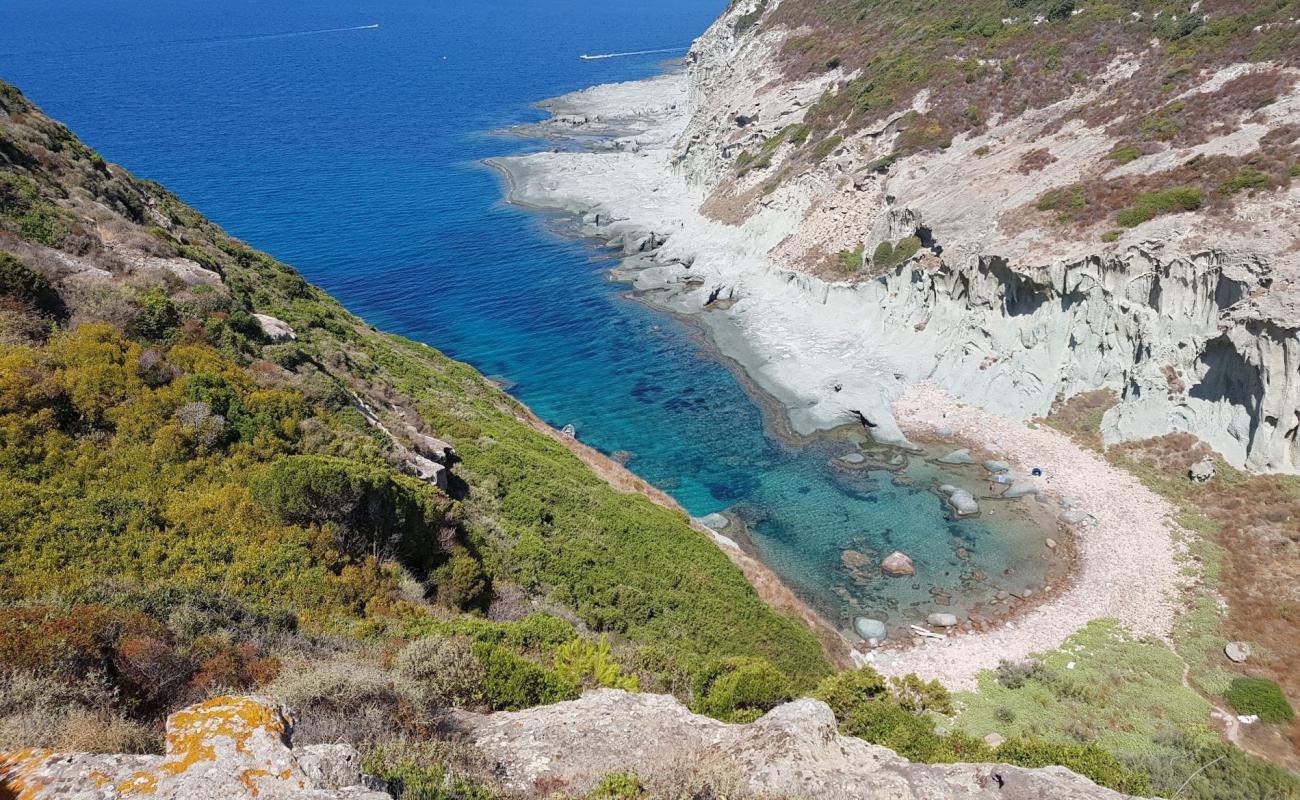 Photo of Cala ' E Moro with rocks cover surface