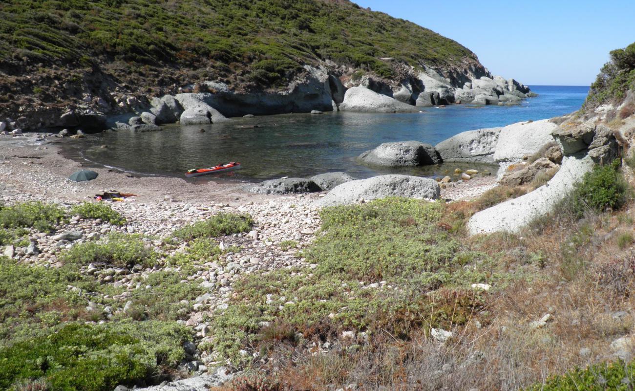 Photo of Cala Rapina with light pebble surface