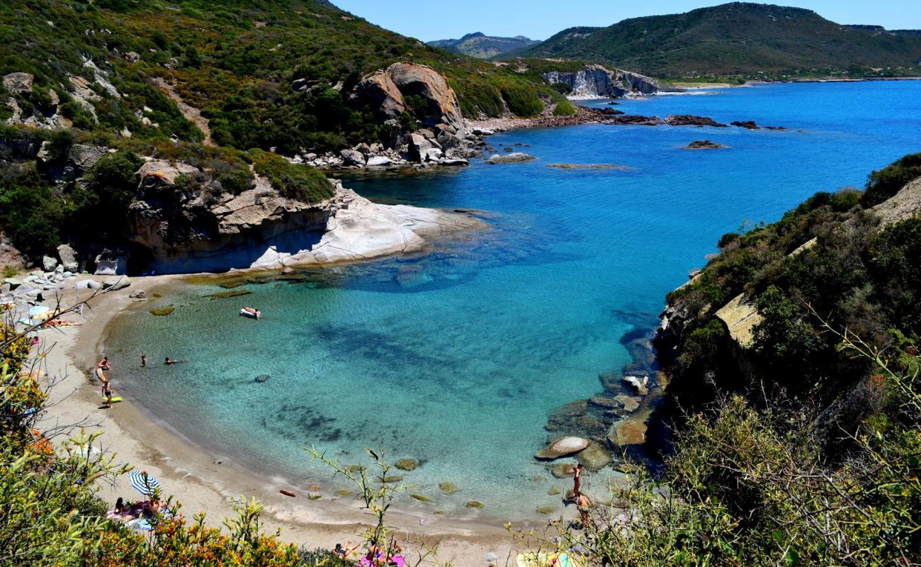 Photo of Spiaggia Cumpoltittu with bright sand surface