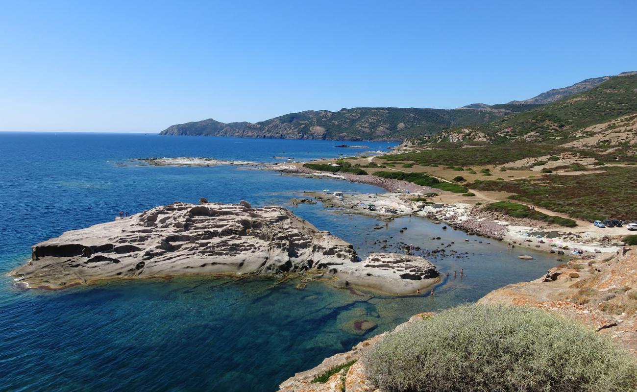 Photo of Torre Argentina beach with rocks cover surface