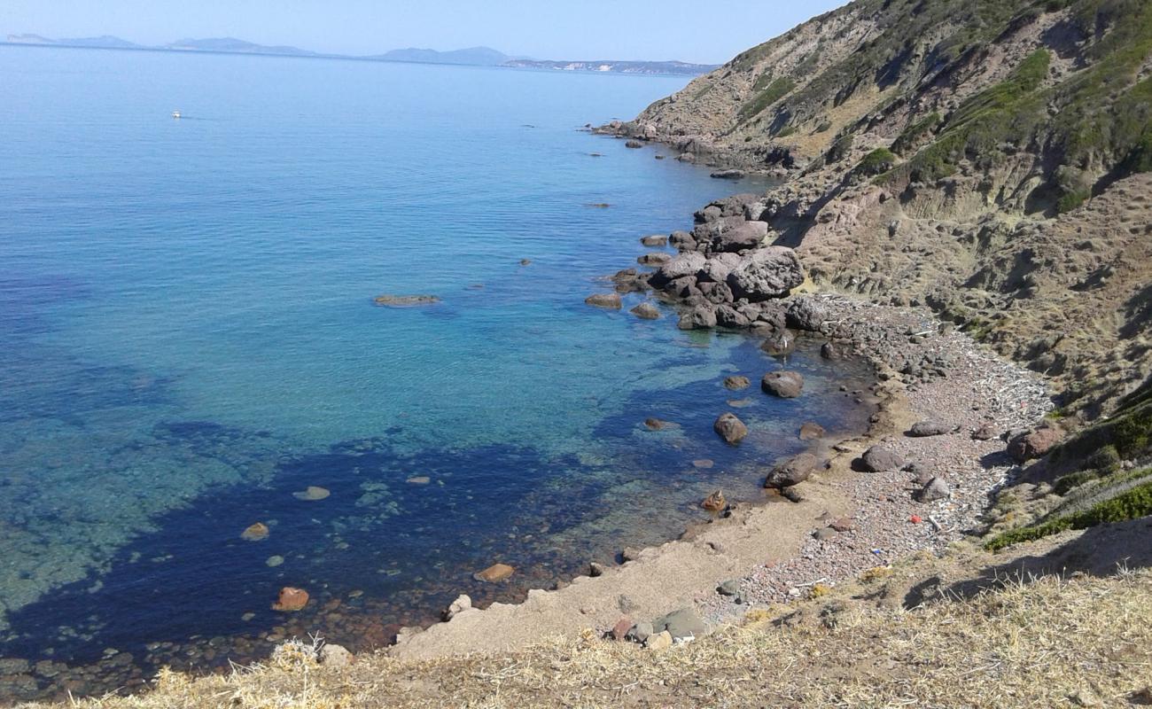 Photo of Porto Tangone with rocks cover surface