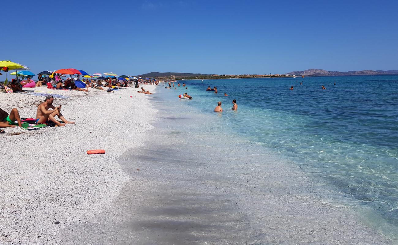 Photo of Spiaggia delle Saline with white fine pebble surface