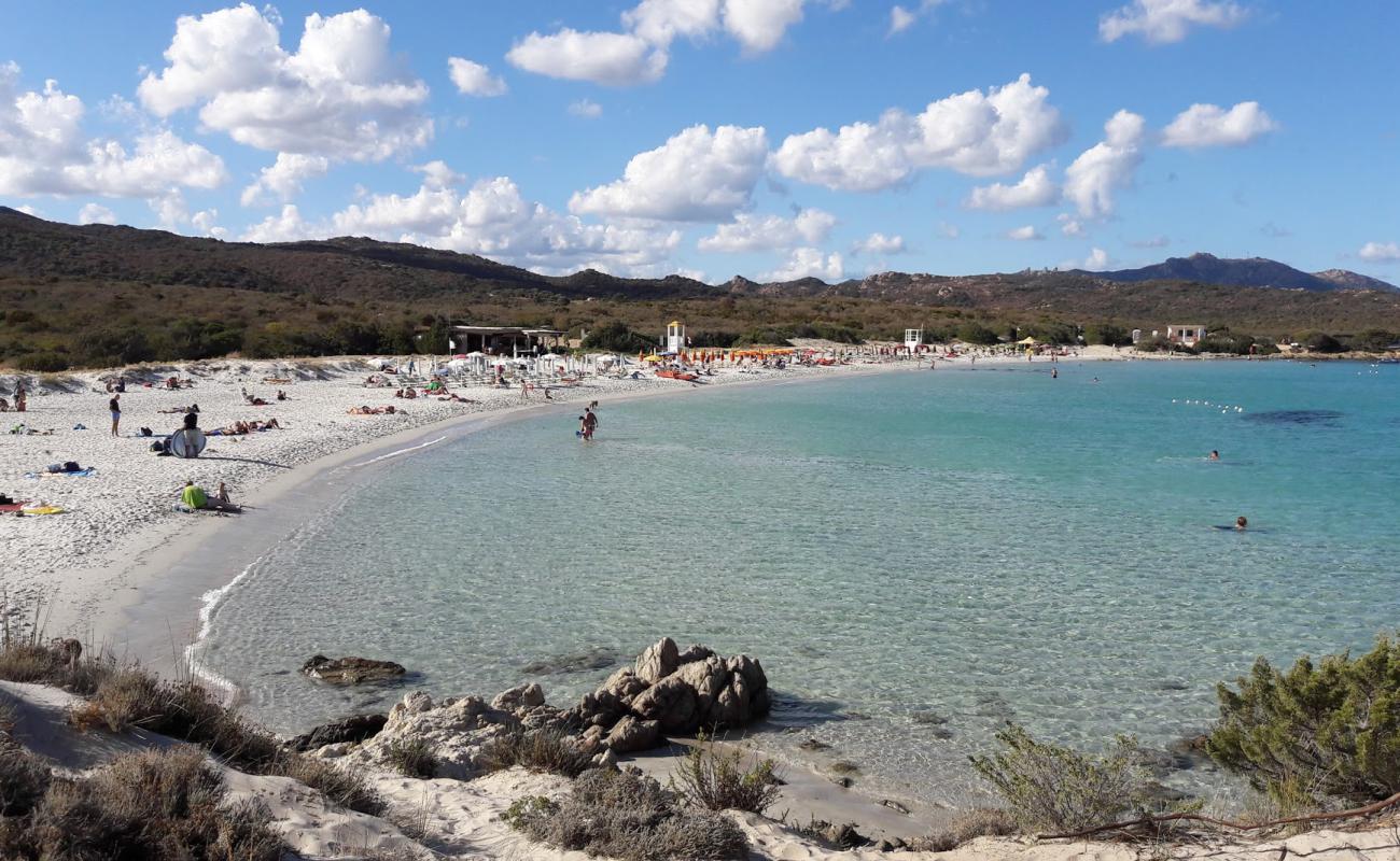 Photo of Portisco Beach with bright sand surface