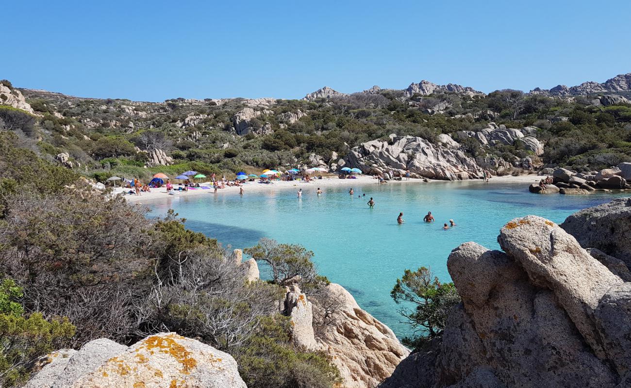 Photo of Cala Serena with bright sand surface