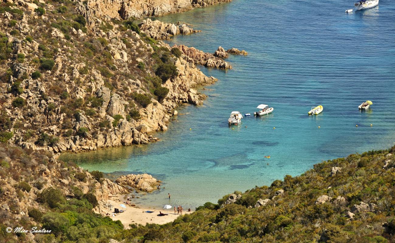 Photo of Spiaggia di Cala Brigantina with white sand surface