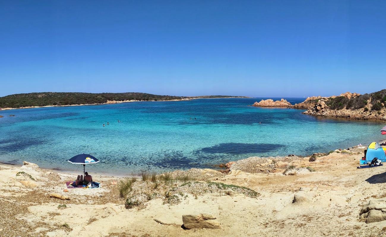 Photo of Cala Andreani with bright fine sand surface