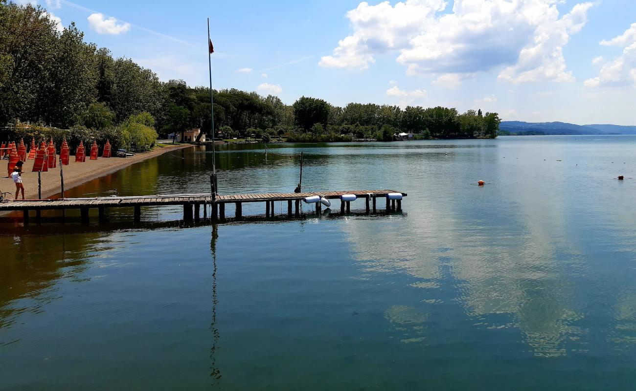 Photo of Spiaggia Lago Bolsena with bright sand surface