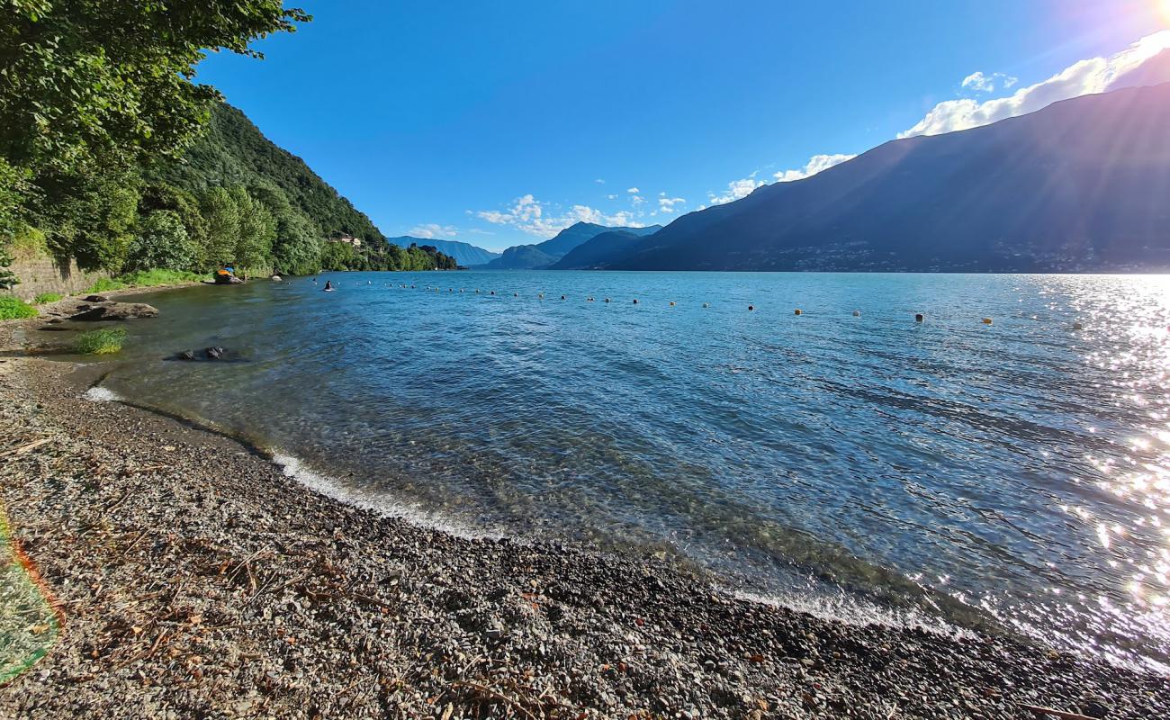 Photo of Spiaggia Tranquilla with gray pebble surface