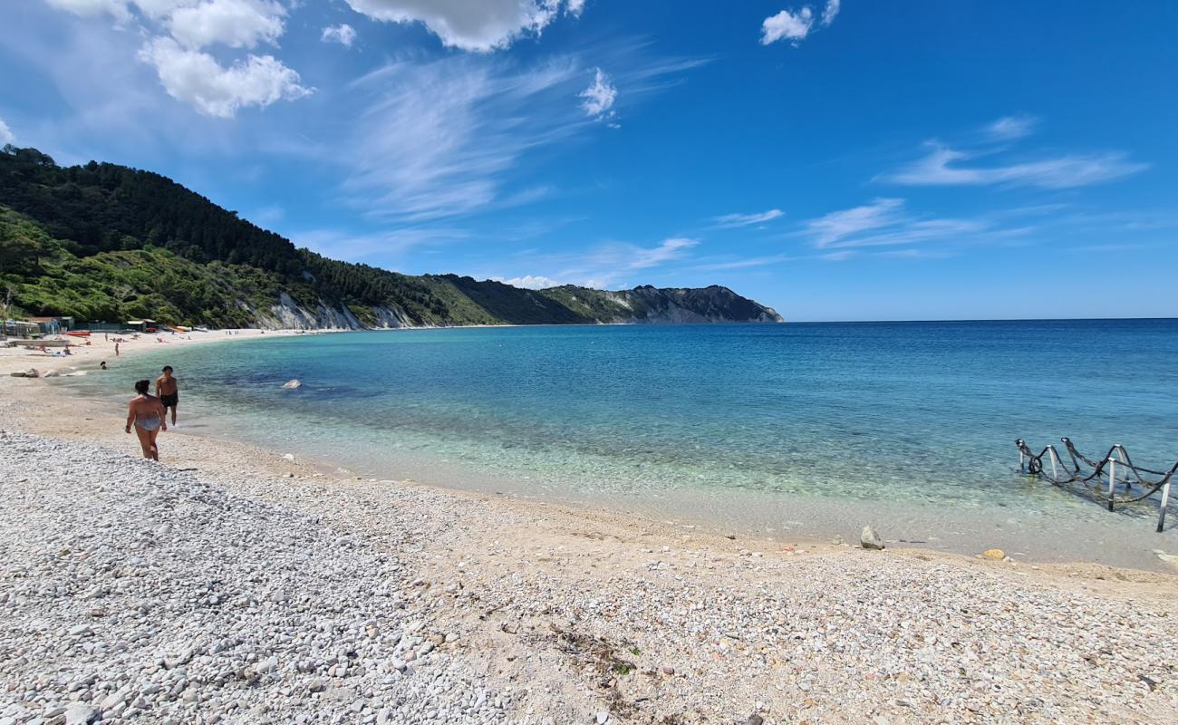 Photo of Spiaggia di Portonovo with light pebble surface