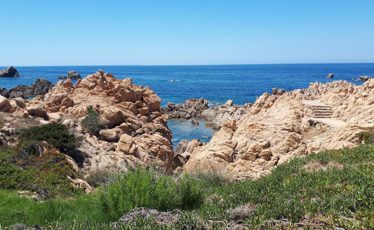 Photo of Spiaggia Li Baietti with rocks cover surface