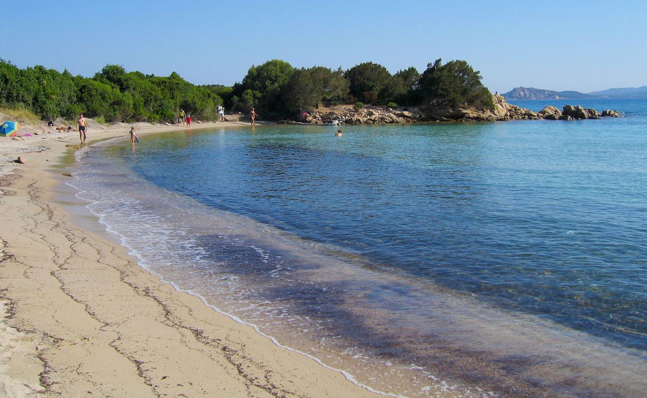 Photo of Spiaggia Le Piscine with bright sand surface