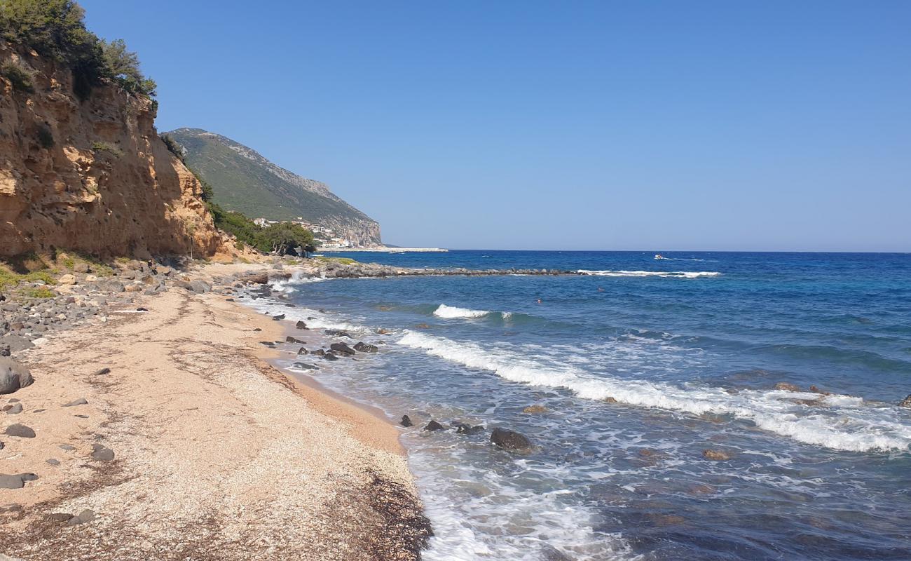 Photo of Spiaggia di S'Abba Meica with rocks cover surface