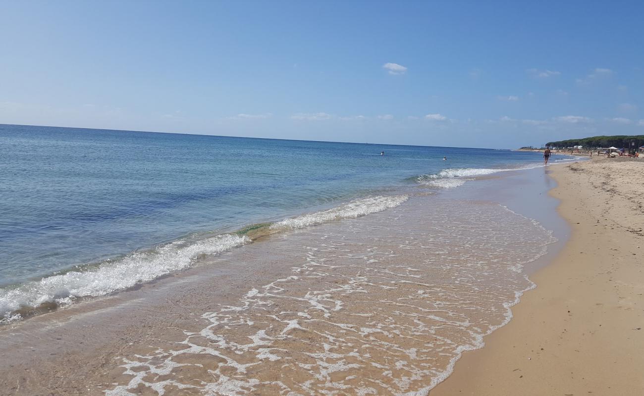 Photo of Spiaggia Foxi e Sali with bright sand surface