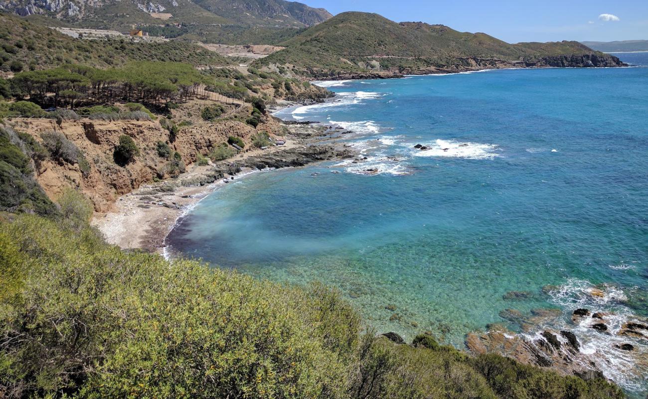 Photo of Spiaggia di Bega sa Canna with gray sand &  rocks surface