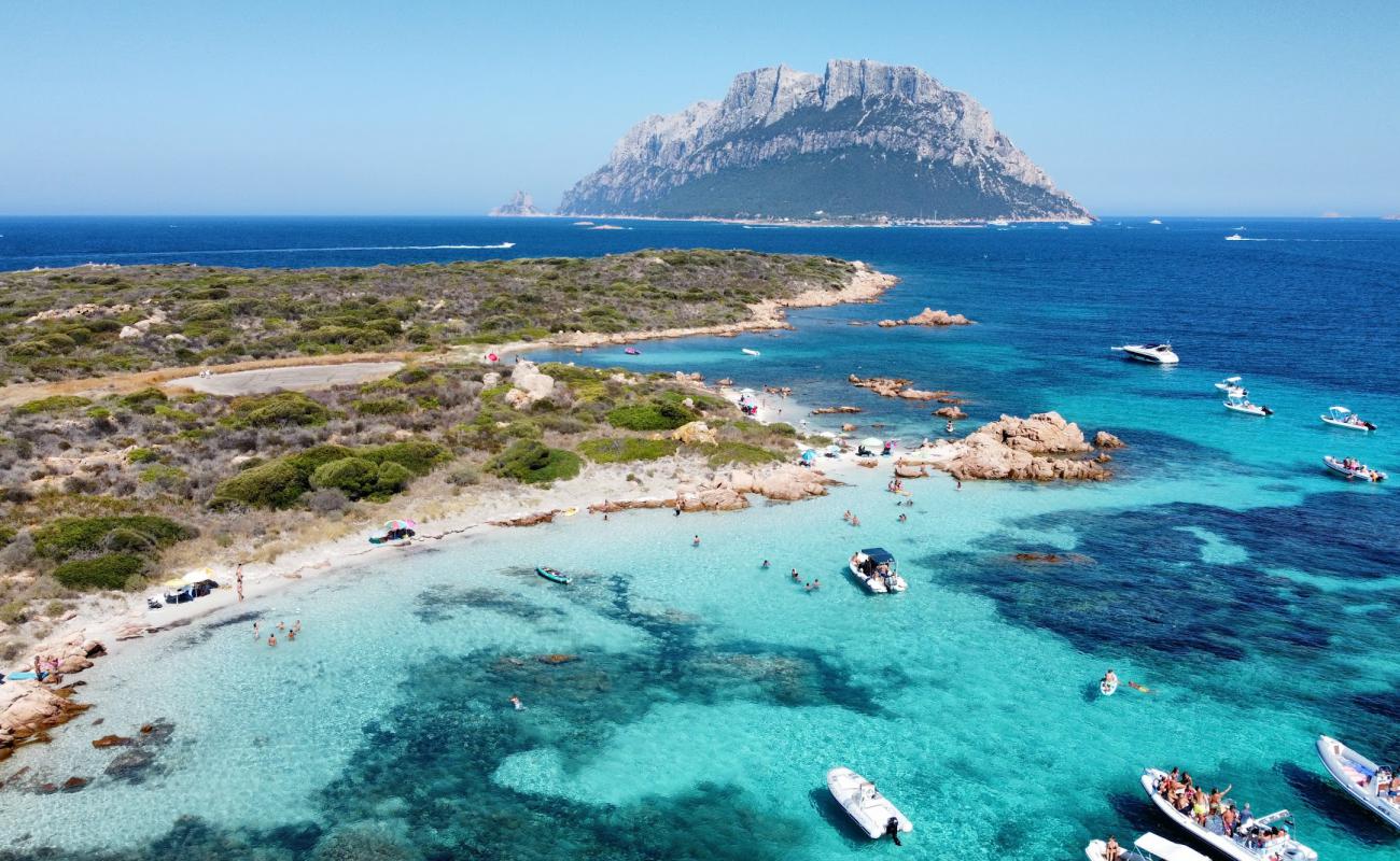 Photo of Spiaggia Sud di Isola Piana with bright sand surface