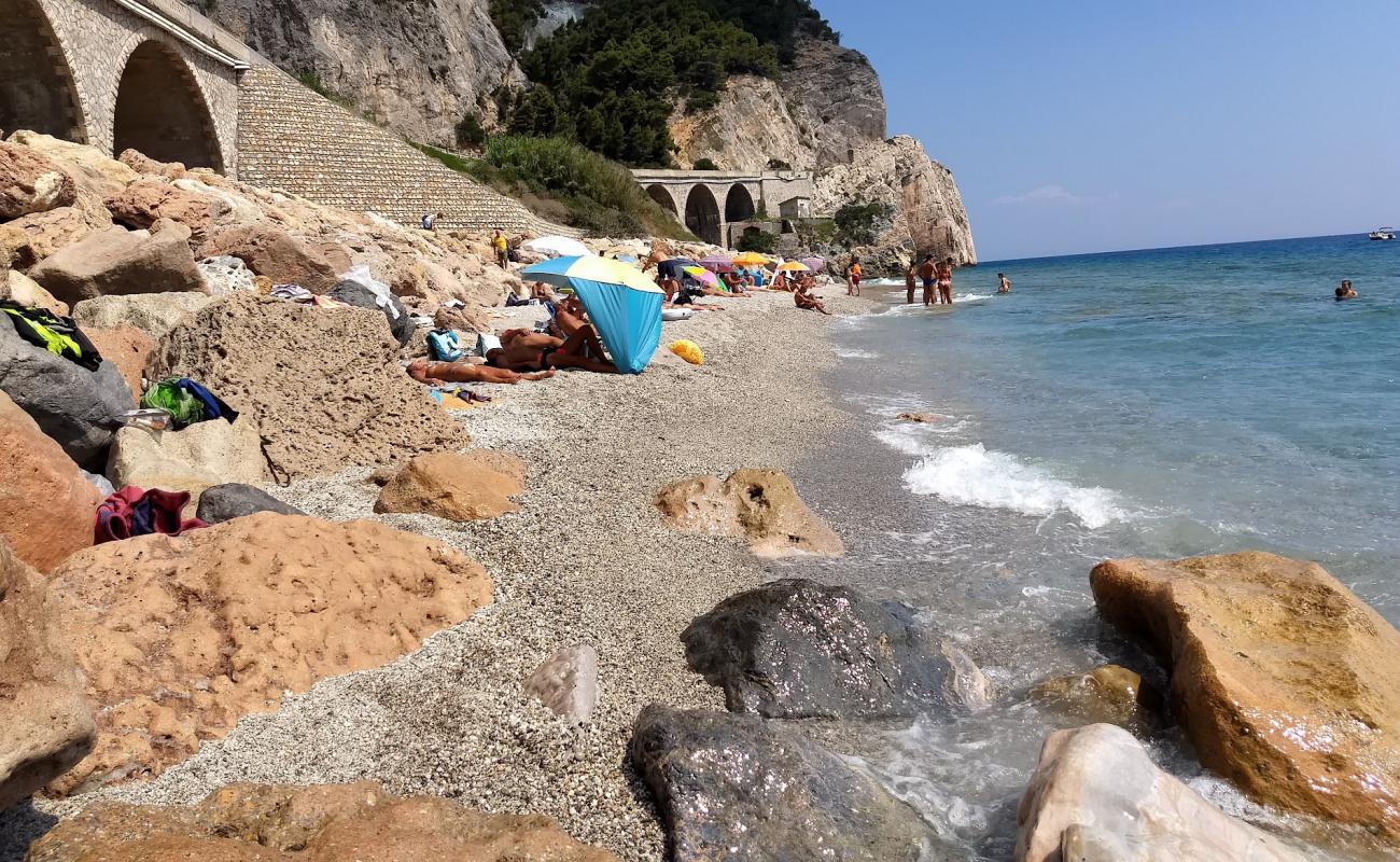 Photo of Spiagge di Tueste with rocks cover surface